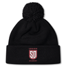 Black fleece-lined Legion Academy Pom Pom Beanie by Canterbury featuring a pom-pom on top and a shield-shaped logo with the letters “SD,” “LEGION” above, and “ACADEMY” below.