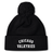 The Chicago Valkyries Pom Pom Beanie by EMB Canterbury is a black knit hat featuring a classic pom-pom on top and "CHICAGO VALKYRIES" embroidered in bold white capital letters on the folded brim. This Canterbury rugby bobble hat is perfect for staying warm at matches or around town.