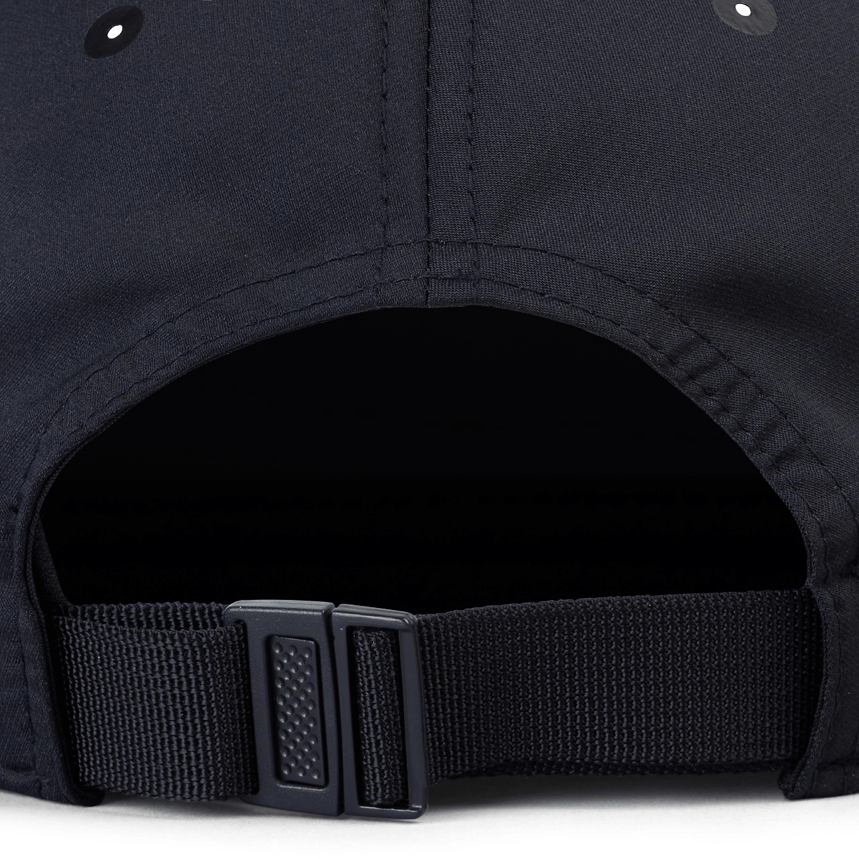 Close-up of the back of the Ireland 24 Tech Logo Cap by Canterbury, highlighting its adjustable strap with a plastic buckle.