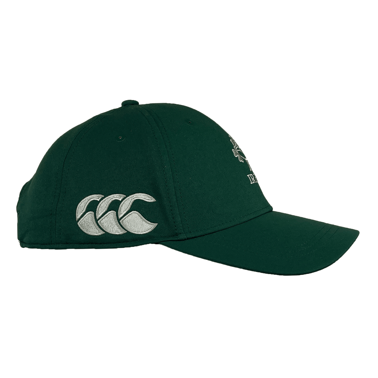 The Ireland 24 Tech Logo Cap by Canterbury is a green cap with silver logo embroidery on the side and front, featuring a curved brim, adjustable strap, and a button on top.