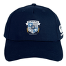 The Milwaukee Barbarians Rugby Flexfit Drill Cap by EMB Canterbury features a navy blue design, the Barbarians crest on the front, a white CCC logo on the side, and a stylish curved brim.
