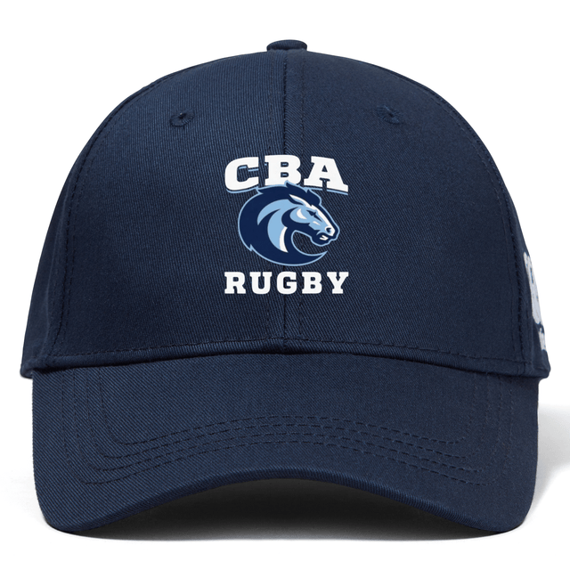 The Christian Brothers Academy Rugby Flexfit Drill Cap by EMB Canterbury comes in navy blue with a curved brim, highlighting "CBA Rugby" and an embroidered horse head logo on the front.
