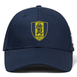 The Gotham Knights Flexfit Drill Cap by Canterbury, from EMB Canterbury, boasts a navy blue color with a curved brim. It features an embroidered yellow and blue shield logo with two lions and the text "GKRFC NYC" on the front.