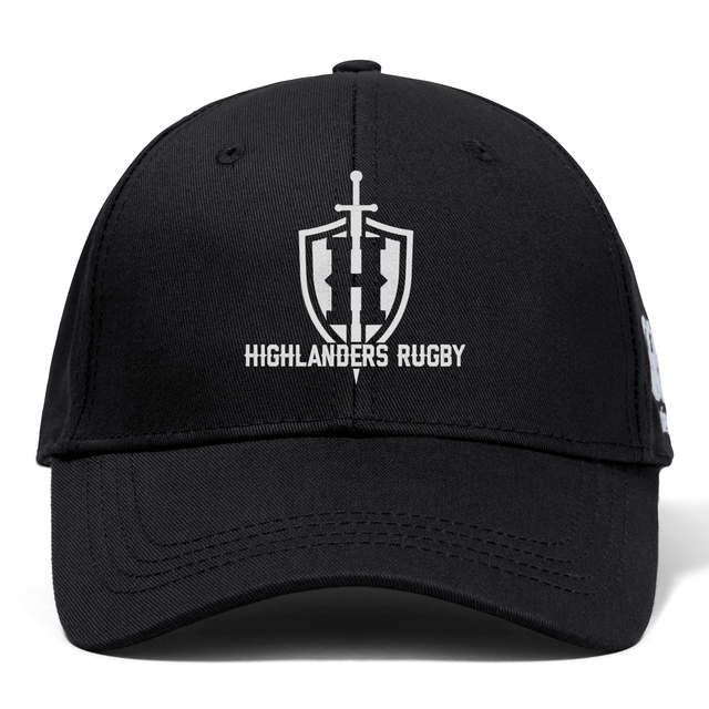 The Highlanders Rugby NC Flexfit Drill Cap by Canterbury is a black baseball cap from EMB Canterbury, showcasing the Highlanders Rugby logo with a sword and shield design above the text "Highlanders Rugby." This comfortable flex fit cap ensures a snug and stylish wear for dedicated fans.