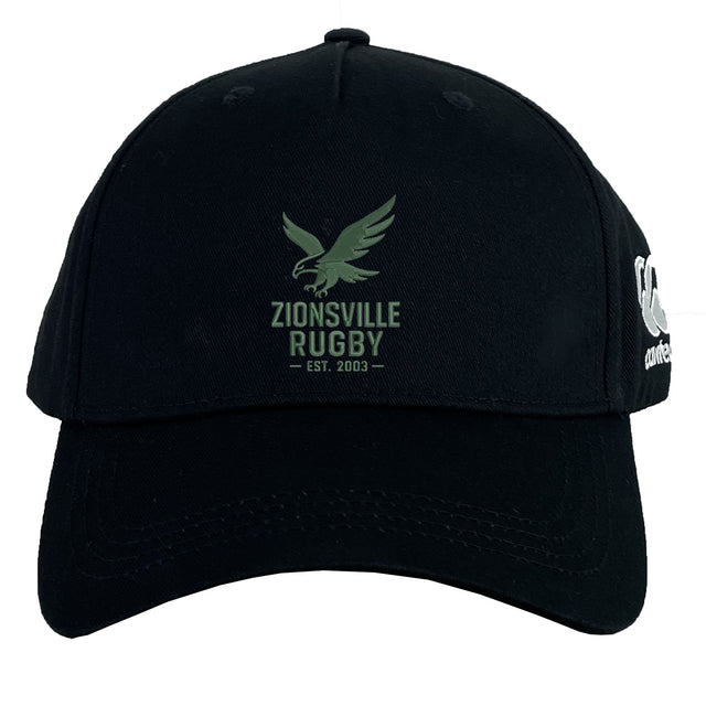 The Zionsville Rugby Club Flexfit Drill Cap by EMB Canterbury features "Zionsville Rugby Est. 2003" and an eagle logo on the front, CCC branding on the side, and delivers comfort and style in a classic curved brim design.