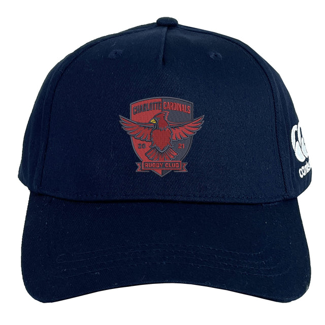 The Charlotte Cardinals Rugby Club Flexfit Drill Cap by Canterbury features a red club logo embroidered on navy blue fabric and a white EMB Canterbury logo on the side.