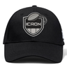 Black ICRON Flexfit Drill Cap by Canterbury with a curved brim and an embroidered shield emblem featuring a rugby ball and the word “ICRON.”