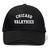 The Chicago Valkyries Flexfit Drill Cap by EMB Canterbury features "CHICAGO VALKYRIES" in bold white lettering across the front and an embroidered logo, offering a stylish and sporty look.