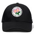 The Society of Iowa Rugby Referees Flexfit Drill Cap by EMB Canterbury is a black cap featuring the embroidered Society of Iowa Rugby Referees logo with two pink flowers and green leaves on the front.