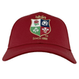 A red British & Irish Lions 2025 Poly Training Cap by Canterbury features a multicolored Canterbury shield emblem with floral and animal designs, along with the "Since 1888" text, reflecting the storied heritage of the British & Irish Lions.