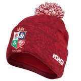The British & Irish Lions 2025 Pom-Pom Beanie by Canterbury is a cozy red beanie featuring the iconic British & Irish Lions logo, the "Since 1888" text, and Homer's signature on the side. Expertly crafted by Canterbury, it offers a touch of heritage warmth.