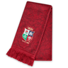 British & Irish Lions 2025 Supporters Scarf by Canterbury: A red scarf with fringed ends, showcasing a crest with four emblems and the text "Since 1888," this piece elegantly embodies Canterbury's branding, making it perfect for any British & Irish Lions enthusiast.