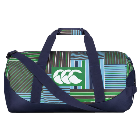 The Uglies Packaway Duffle Bag by Canterbury features navy blue straps, a geometric pattern in blue, green, and brown, and a white logo on a green rectangle—ideal as a portable sports bag for any occasion.