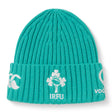 The Ireland 26 Beanie by Canterbury is a teal ribbed knit hat featuring embroidered white logos, including a shamrock rugby emblem and “IRFU” text on the folded brim.