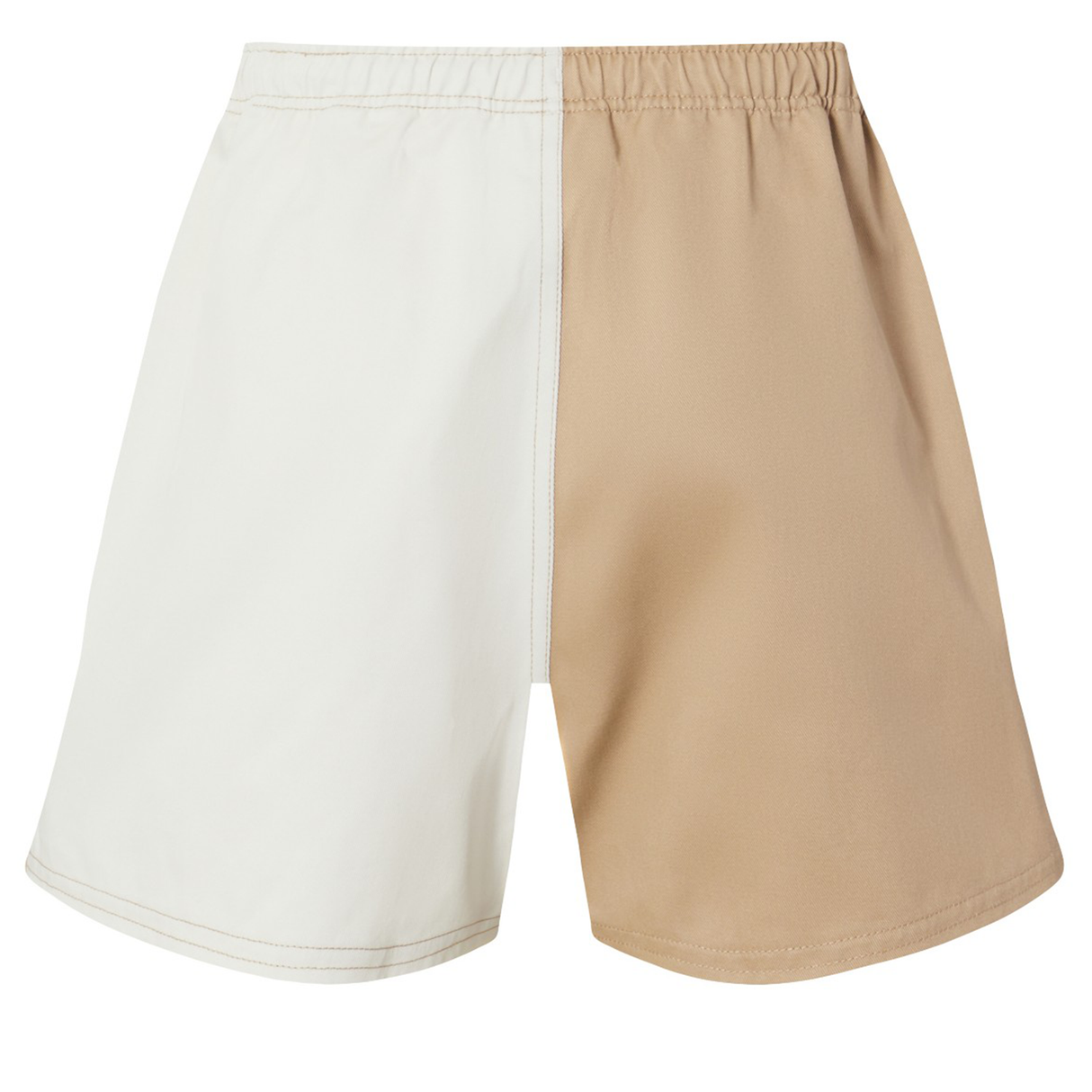 The Fundamental Harlequin Drill 3" Shorts by Canterbury feature an elastic waistband and a distinctive two-tone design—white on the left and beige on the right.