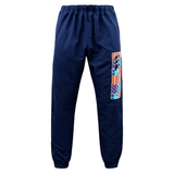 The Canterbury CCC Uglies Tapered Cuff Stadium Pant - Peacoat, featuring an elastic waistband and cuffs, offers both style and comfort with its colorful geometric design on the left leg and prominent Canterbury branding.