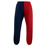 Canterbury Harlequin Stadium Track Pant with a blue and red two-toned sweatpants design, isolated on a white background.