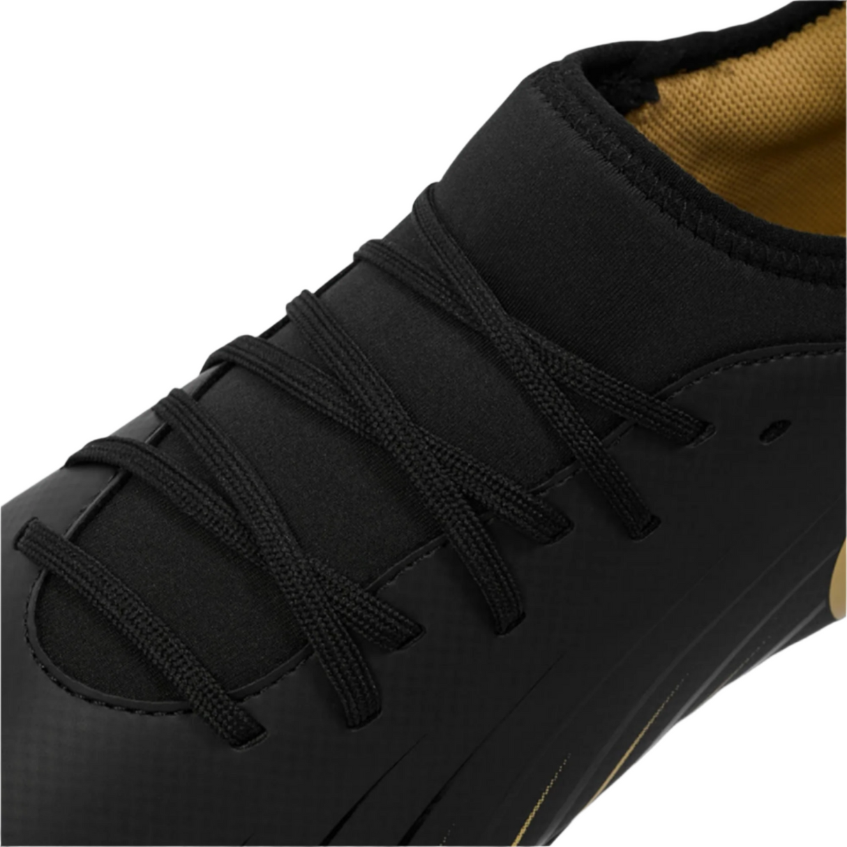 Close-up of the Canterbury Speed Falcon Team FG rugby boot by Canterbury, featuring a black design with black laces and a gold interior lining—ideal for firm ground play.