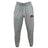 The Angry Newts Leisure Sweatpant by EMB Canterbury features gray organic cotton fleece, a drawstring, elastic waistband and cuffs, with red dinosaur and white logos on the thighs. Sustainable materials provide ultimate comfort.