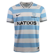 The Racing 92 25/26 Replica Home Jersey by Nike features light blue and white stripes, a black Nike logo, shield emblem, "Racing 92," and "NATIXIS" sponsor on the front—perfect for true fans.