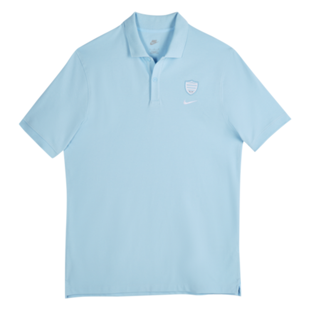 The Racing 92 25/26 Pique Polo by Nike features a light blue, short-sleeve design with a collar, three-button placket, and left chest logos. Made from breathable cotton for comfort and style.