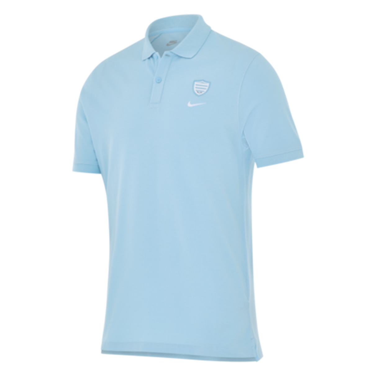The Racing 92 25/26 Pique Polo by Nike is a light blue, breathable cotton polo with short sleeves, a two-button collar, and white Nike and Racing 92 shield logos on the left chest.