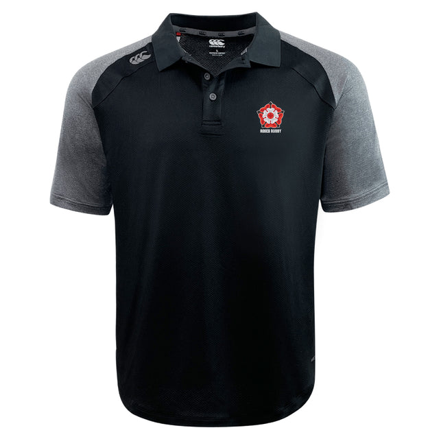 The EMB Canterbury Roses Rugby Elite Polo features short sleeves, a buttoned collar, and a red and white embroidered logo on the chest. It's black and gray, crafted from lightweight, durable Vapodri fabrics for ultimate comfort and style.