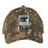 The EMB S&S Activewear Birmingham Steel Rugby Camo Cap in Realtree Extra features an embroidered team logo on the front, delivering a rugged and stylish look.