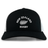 The Nations of Rugby New Zealand Retro Trucker Cap by EMB S&S Activewear features a black and white design, "New Zealand Rugby" text, silver fern logo on the front, and a classic snapback closure for adjustable fit.