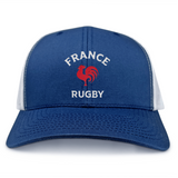 The Nations of Rugby France Retro Trucker Cap by EMB S&S Activewear is a blue and white snapback hat featuring "FRANCE RUGBY" text and a red rooster graphic on the front panel for adjustable fit.