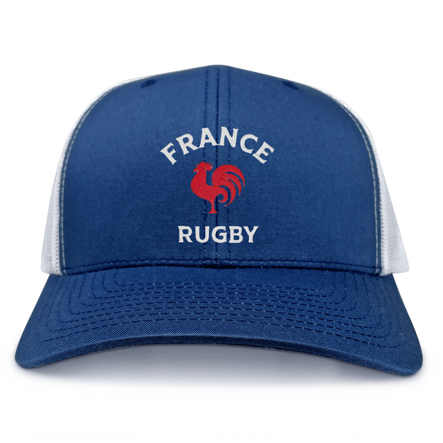 The Nations of Rugby France Retro Trucker Cap by EMB S&S Activewear is a blue and white snapback hat featuring "FRANCE RUGBY" text and a red rooster graphic on the front panel for adjustable fit.