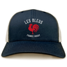 The Les Bleus France Rugby Retro Trucker Cap by EMB S&S Activewear features a bold red rooster graphic and “LES BLEUS” and “FRANCE RUGBY” text on navy blue and beige, perfect for France Rugby fans.