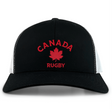 The Nations of Rugby Canada Rugby Retro Trucker Cap by EMB S&S Activewear features "CANADA RUGBY" with a red maple leaf logo and an adjustable snapback closure for comfort in classic black and white.