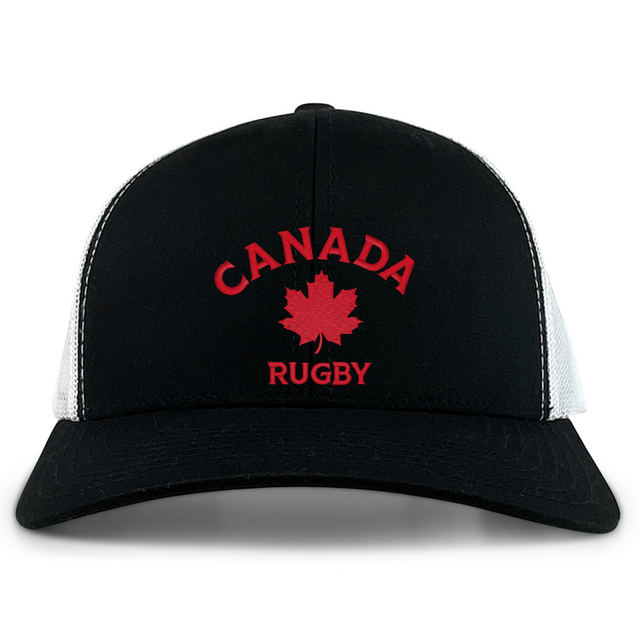 The Nations of Rugby Canada Rugby Retro Trucker Cap by EMB S&S Activewear features "CANADA RUGBY" with a red maple leaf logo and an adjustable snapback closure for comfort in classic black and white.
