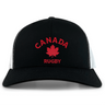 The Nations of Rugby Canada Rugby Retro Trucker Cap by EMB S&S Activewear features "CANADA RUGBY" with a red maple leaf logo and an adjustable snapback closure for comfort in classic black and white.