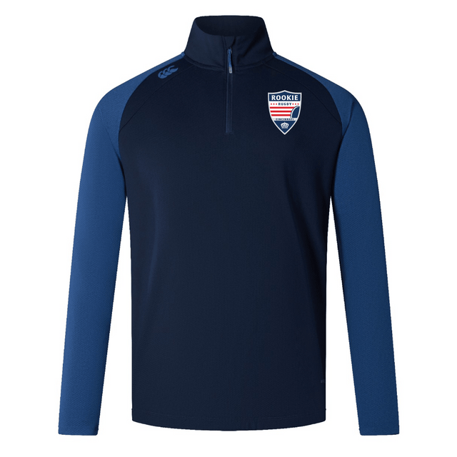 Navy blue quarter-zip long-sleeve sport pullover with a light blue side panel, featuring a Cincinnati Rookie Rugby Elite First Layer badge and EMB Canterbury logo on the chest. Designed with moisture-wicking VapoDri technology, perfect for rugby training.