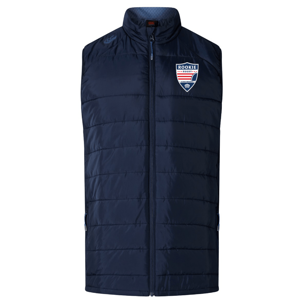 Navy blue padded Cincinnati Rookie Rugby Elite Microlite Gilet by EMB Canterbury with a high collar and zip-up front, featuring a "rookie" badge on the left chest.
