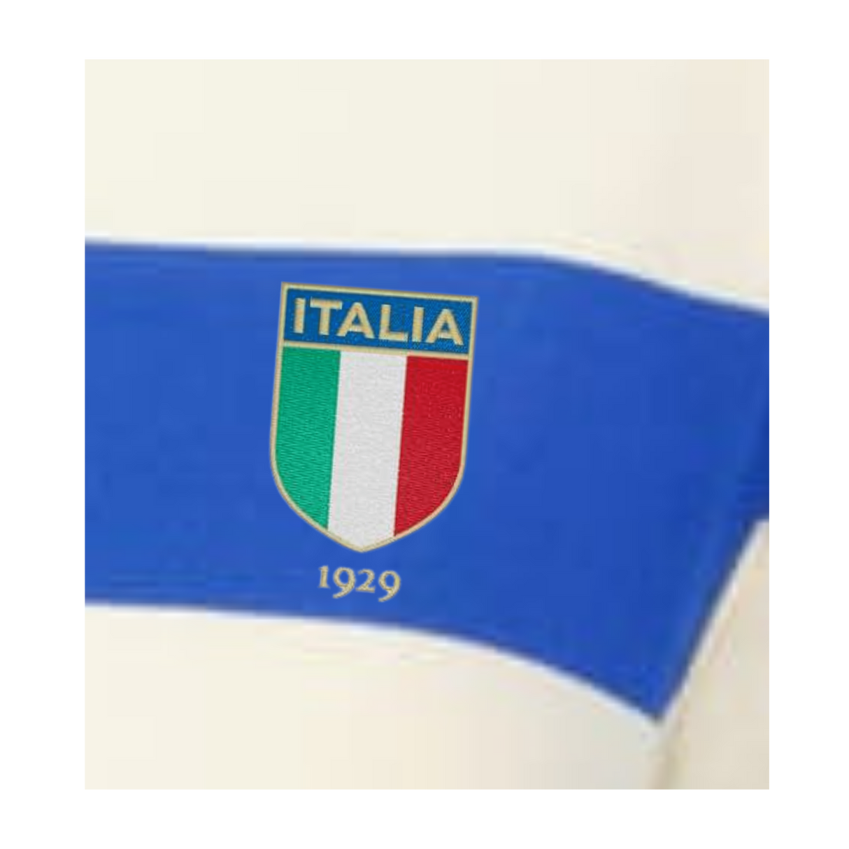The EMB Augusta Women's Vintage Italy Prep Street Rugby Crop features a shield-shaped Italia crest with the Italian flag colors and "1929" in gold, set on white with a blue stripe—a stylish nod to classic rugby style.