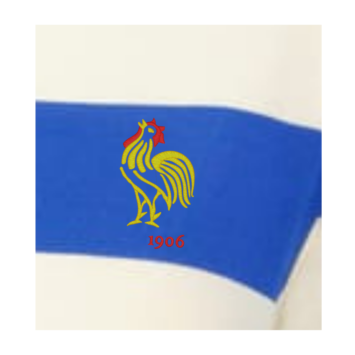 Show your love for women's prep street rugby with the EMB Augusta Women's Vintage France Prep Street Rugby Crop, featuring a yellow rooster with red accents and "1906" on a blue stripe over a white background.