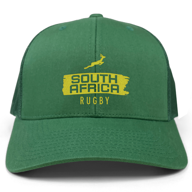 The EMB S&S Activewear Nations of Rugby South Africa Brush Stroke Retro Trucker Cap features bold "SOUTH AFRICA RUGBY" text and a springbok logo—an ideal addition to any rugby supporter's collection.