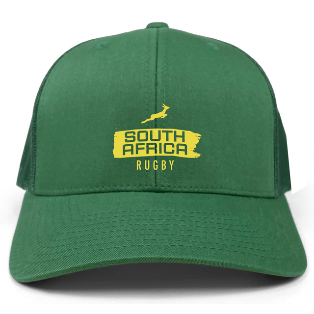 The EMB S&S Activewear Nations of Rugby South Africa Brush Stroke Retro Trucker Cap features a green design, "South Africa Rugby" lettering, yellow springbok logo on the front, and an adjustable snapback closure.