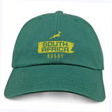 Show your support with the Nations of Rugby South Africa Brush Stroke Dad Cap by EMB S&S Activewear, featuring an embroidered yellow springbok and "South Africa Rugby" logo on the front. Perfect for fans!.