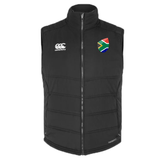 The South Africa Shield Core Gilet by EMB Canterbury is a black, sleeveless gilet with a South Africa Shield flag patch and a white logo on the front.