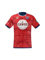 The Teamatical CenCal Rugby Reversible Jersey is red with a blue collar and cuffs, featuring "Ashwood Construction Inc." on the front plus sponsor logos on the chest and sleeves.