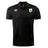 The SoCal Youth Rugby Club Dry Polo by EMB Canterbury is a black short-sleeve polo with a collar, featuring the Canterbury logo on the right chest and a green and yellow crest on the left. Made with Vapodri tech for breathable comfort.