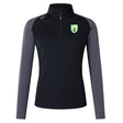 The SoCal Youth Referees Women's Elite First Layer by EMB Canterbury is a black and gray long-sleeve pullover with VapoDri tech, a green dragon crest on the left chest, and a right shoulder logo—ideal for women referees.