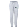 The Seacoast Rugby Club Women's Leisure Sweatpant by EMB Canterbury features a light gray color, drawstring waist, and three small bottle graphics on the left thigh—crafted for comfort and style.