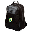 The EMB Canterbury SoCal Youth Rugby Medium Backpack features black fabric with gray accents, a top handle, multiple zippered compartments, a padded laptop pocket, mesh side pocket, and a SoCal Youth Rugby patch on the front.