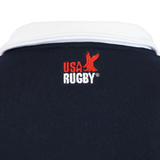 Close-up of the SDS USA Rugby Rugger Sweater, a navy pullover with a white collar, embroidered red eagle, and "USA RUGBY" text—an iconic piece of American rugby apparel.