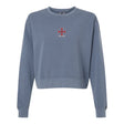 The SF CDME Rugby Women’s Garment-Dyed Mid-Length Crewneck Sweatshirt by EMB S&S Activewear features a blue, heavyweight fleece construction for a cozy feel, and showcases a small red and white cross emblem along with the text “ONE STAR” centered on the chest.
